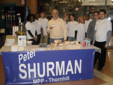 Peter and volunteers serving pancakes to Thornhill constituents