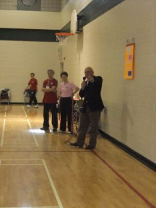 Peter speaking the the member of the club