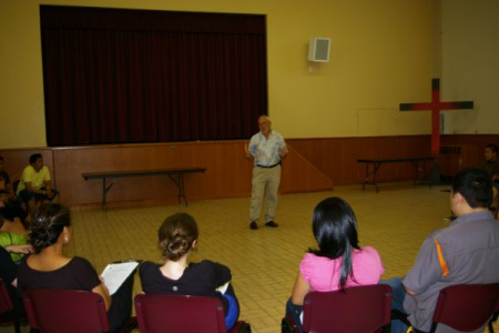Peter talking to students