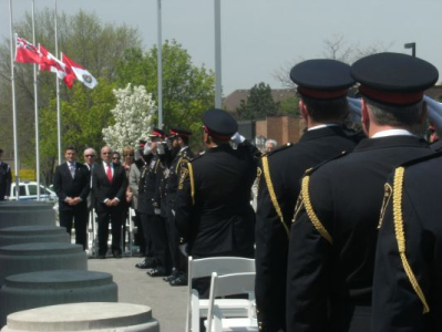 Peter standing in observance of those officers who made the ultimate sacrifice.