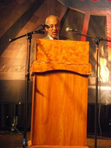 Peter reading a condolence message from the official opposition.