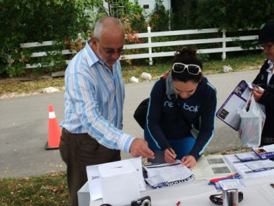 Peter with a constituent signing the HST Petition