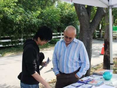 Peter explaining the HST to a constituent