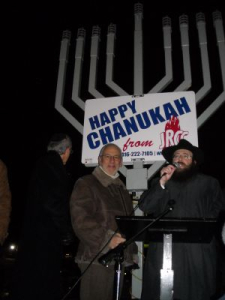 Peter preparing to light the menorah
