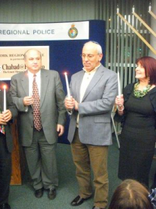 Peter assisting with the lighting of the menorah